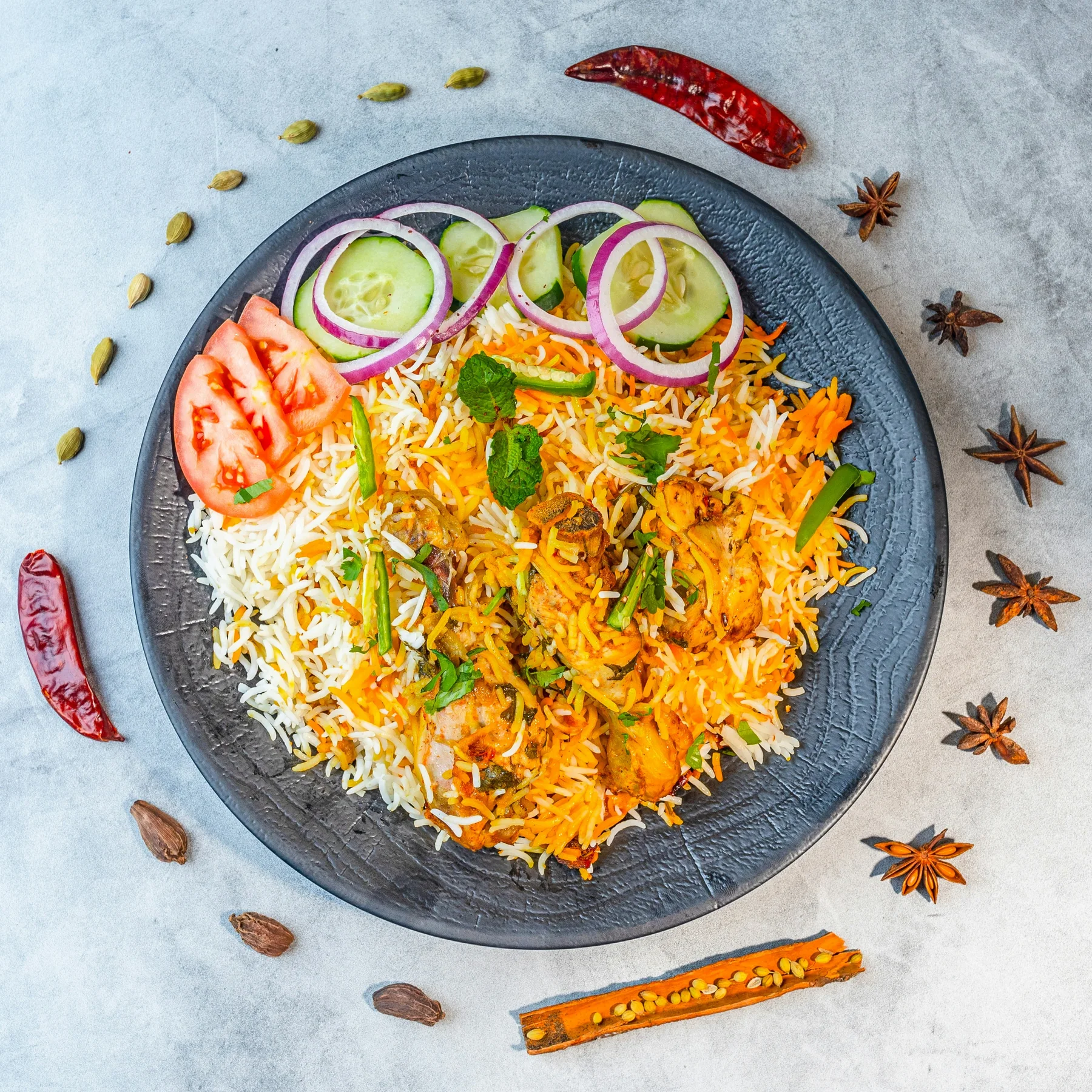 Butter chicken in a silky orange sauce served with rice